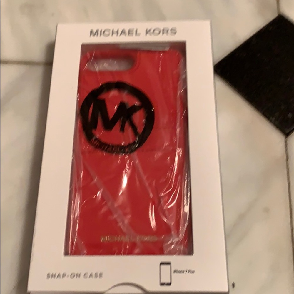 Authentic Michael kors snap on case .